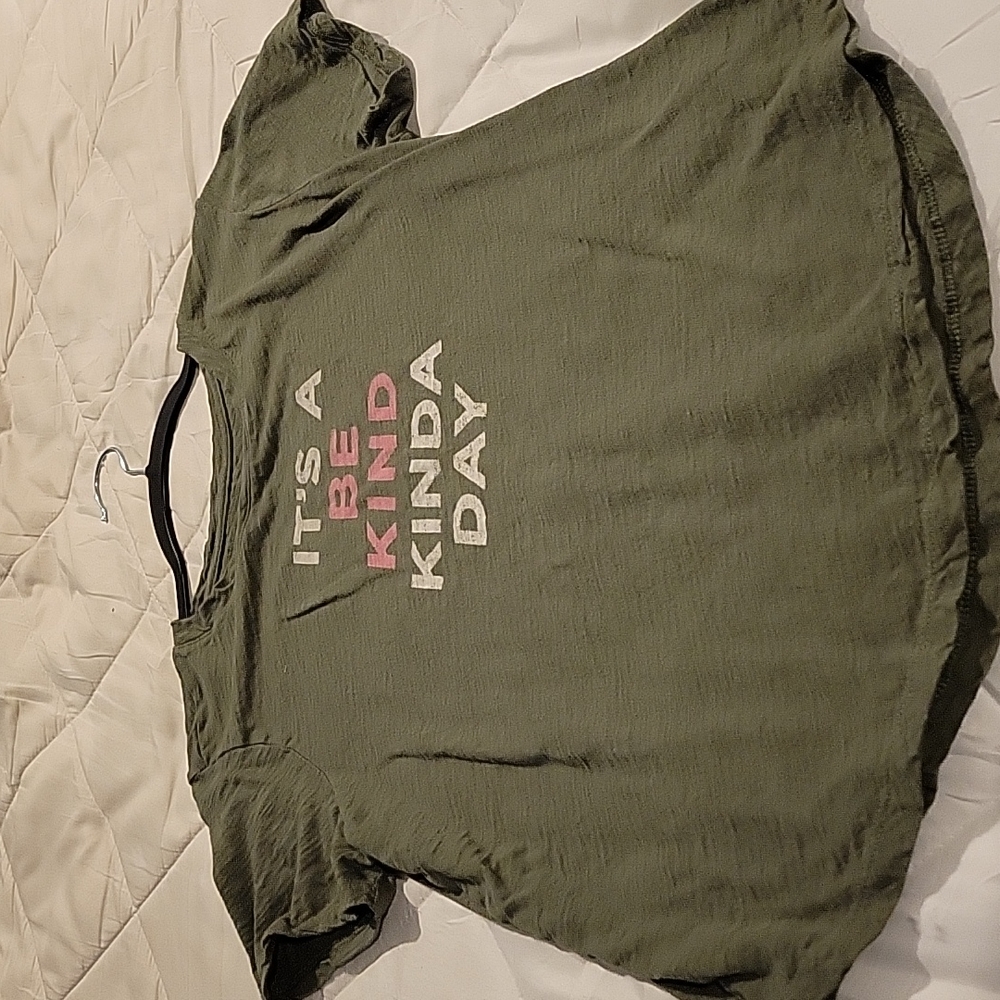 A navy green shirt, brand old navy. It's a medium.